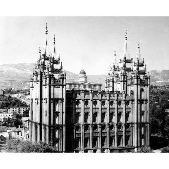 The Salt Lake City Mormon Temple With Utah'S State Capitol Building In The Background History