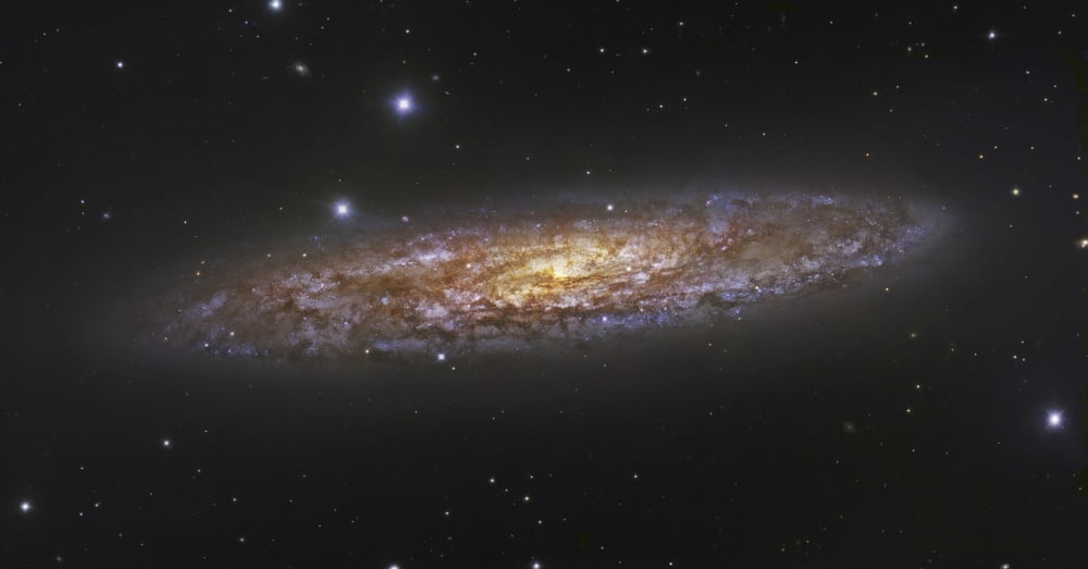 The Sculptor Galaxy Canvas Art - Robert GendlerStocktrek Images (39 x 20)