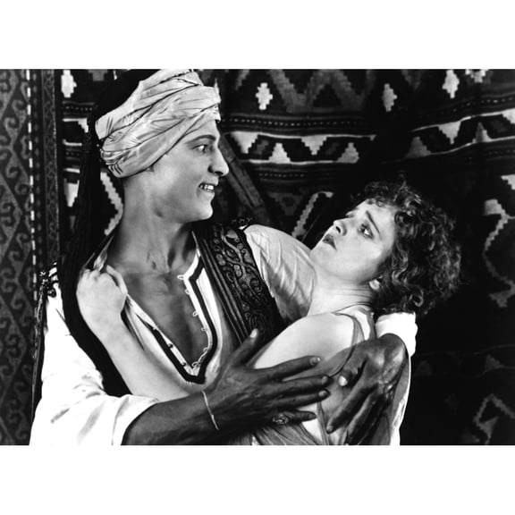 The Sheik From Left: Rudolph Valentino Agnes Ayres 1921 Photo Print (14 x 11)