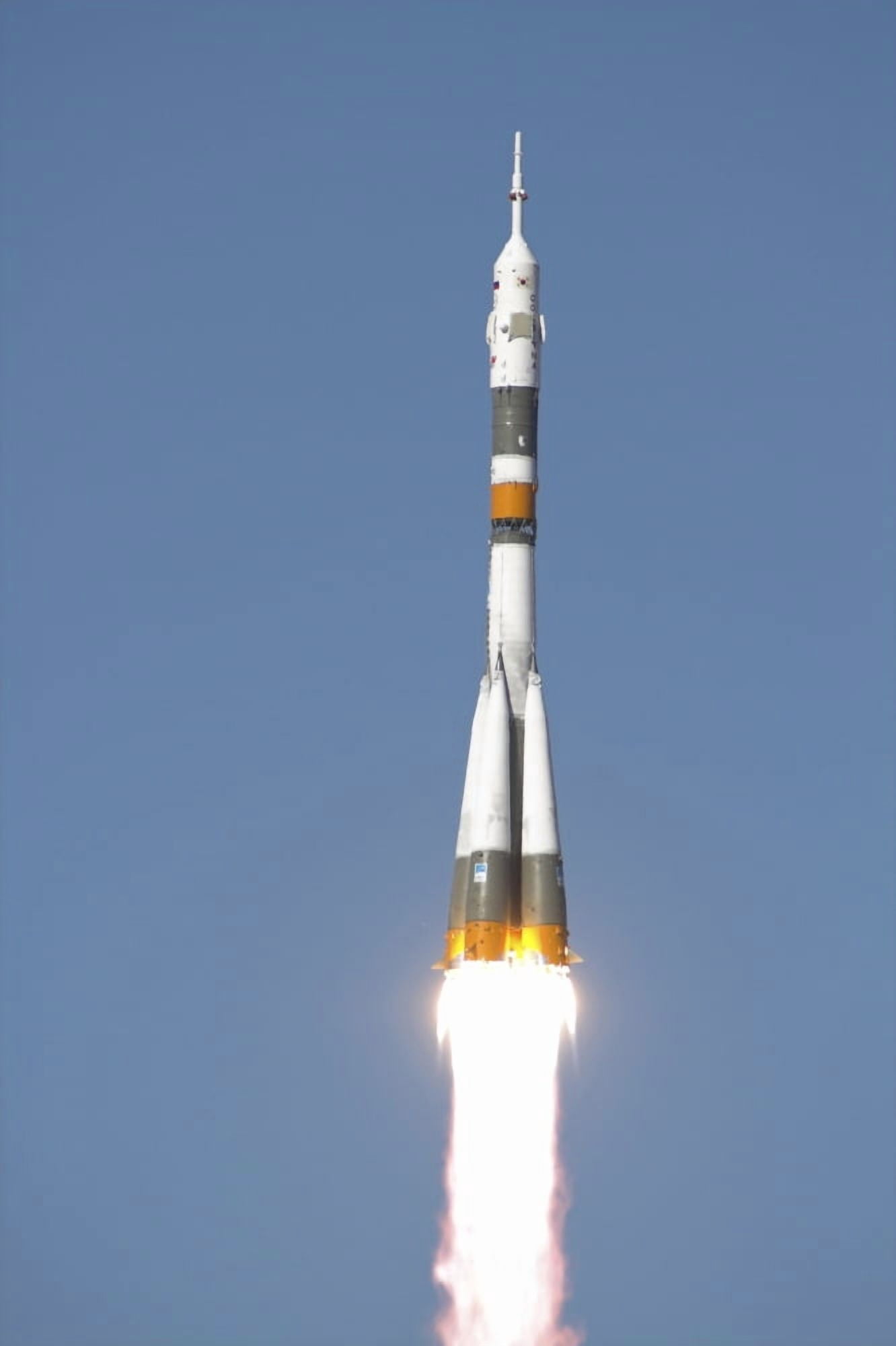 The Soyuz TMA-12 spacecraft lifts off into a cloudless sky Canvas Art - Stocktrek Images (23 x 34)