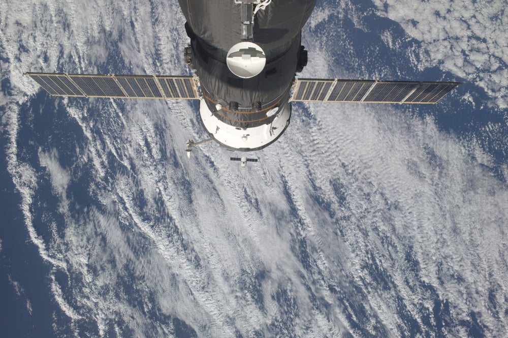 The SpaceX Dragon commercial cargo craft approaches the International Space Station Canvas Art - Stocktrek Images (34 x 23)