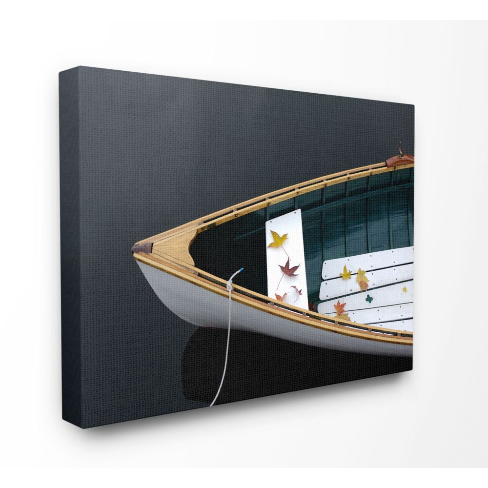 The Stupell Home Decor Collection Bow of Wooden Boat with Fallen Leaves Canvas Wall Art