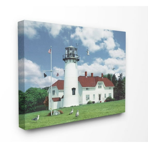 The Stupell Home Decor Collection Chatham Lighthouse Bright Green Hill Blue Sky and Red Roof Canvas Wall Art