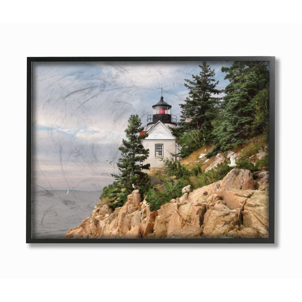 The Stupell Home Decor Collection Harbor Lighthouse Seaside Photograph with Fir Trees and Rocky Cliff Framed Giclee Texturized Art