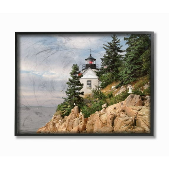 The Stupell Home Decor Collection Harbor Lighthouse Seaside Photograph with Fir Trees and Rocky Cliff Framed Giclee Texturized Art