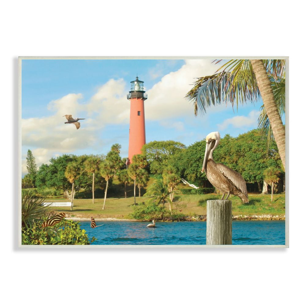 The Stupell Home Decor Collection Juptier Inlet Bright Red Lighthouse with Tropical Birds and Palm Trees Wall Plaque Art