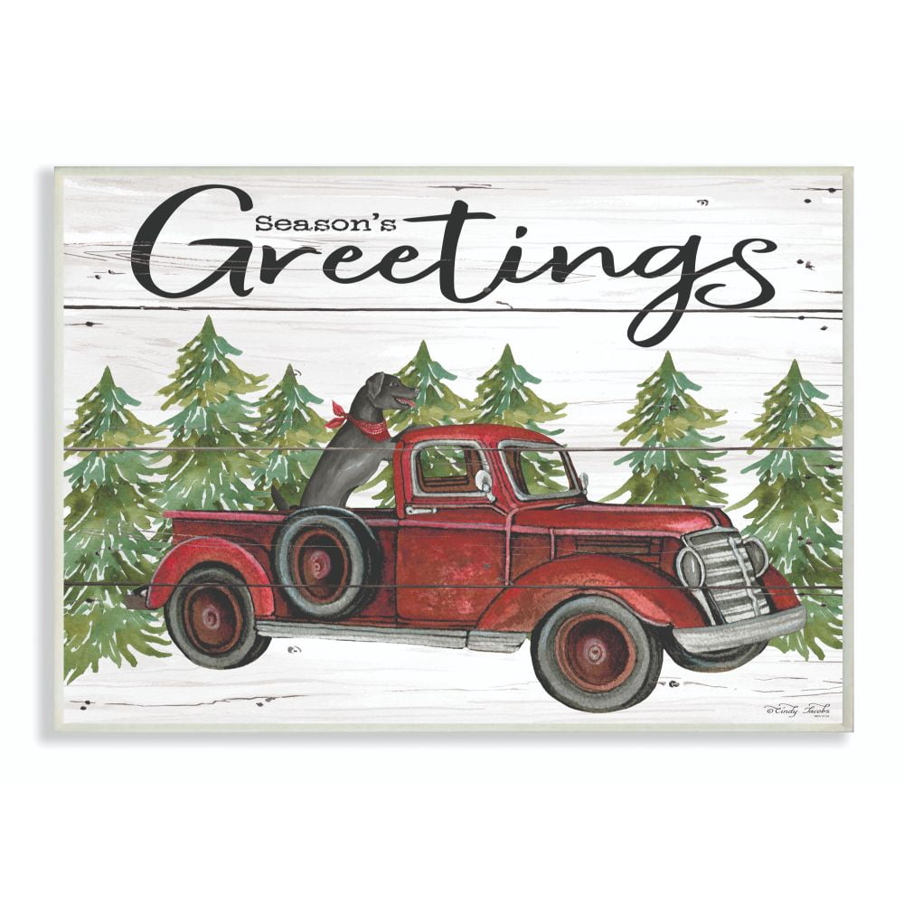 The Stupell Home Decor Collection Seasons Greetings Dog in a Red Truck on Planks Wood Wall Art