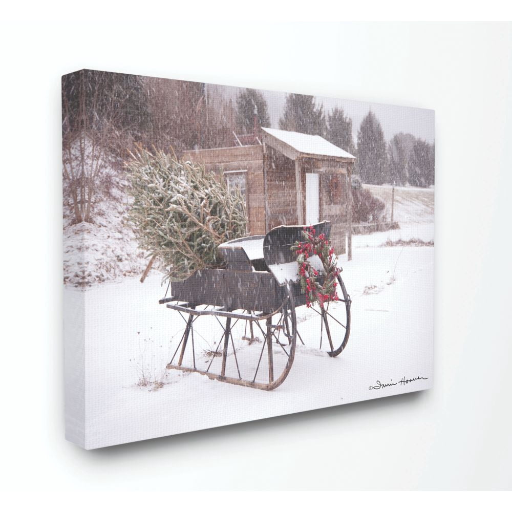 The Stupell Home Decor Collection Snow Sleigh with Tree and Wreath Photograph Canvas Wall Art