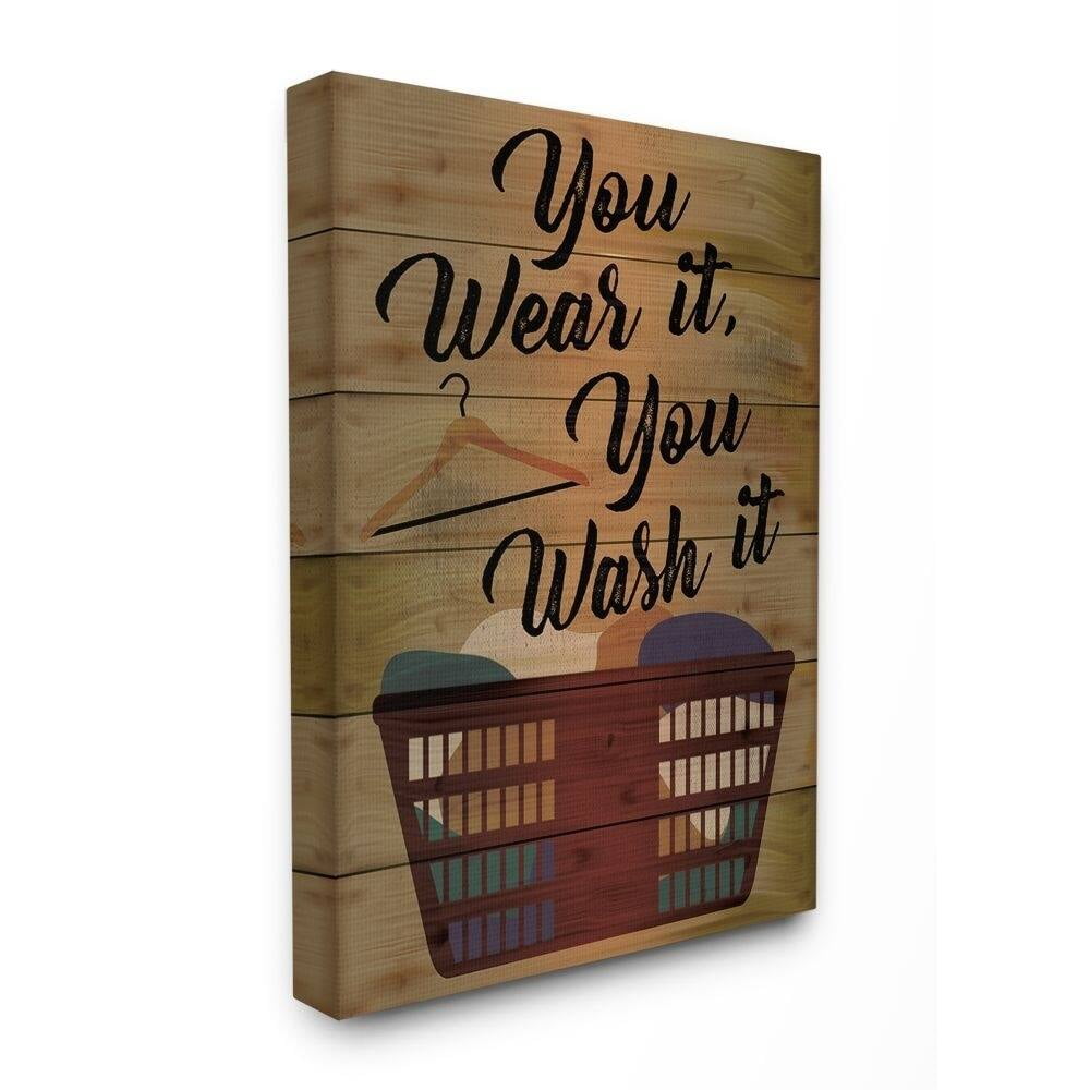 The Stupell Home Decor Collection You Wear It, You Wash It Wood Plank Look Typography with Hamper Canvas Wall Art