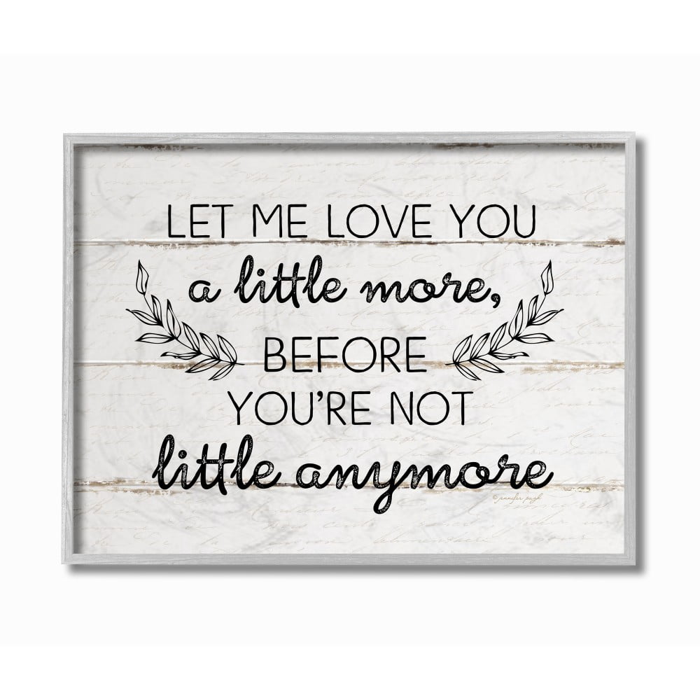 The Stupell Home Decor Let Me Love You A Little More Rustic Planked Wood Look with Laurel Leaves