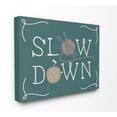 thumbnail image 1 of The Stupell Home Decor Teal Slow Down Hygge Typography with Yarn and Coffee Illustration Canvas Wall Art, 1 of 2