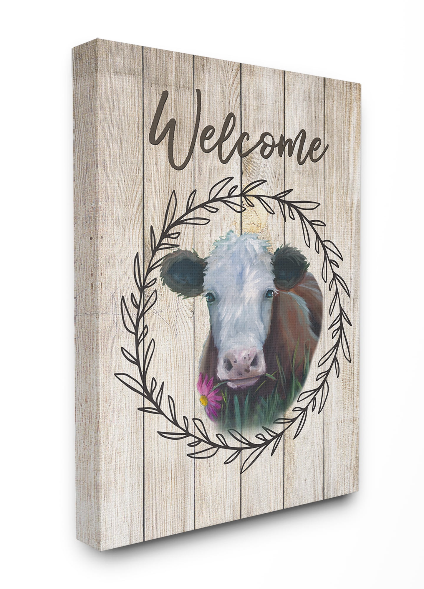 The Stupell Home Decor Welcome Sign Painted Cow with Flower and Wreath Canvas Wall Art