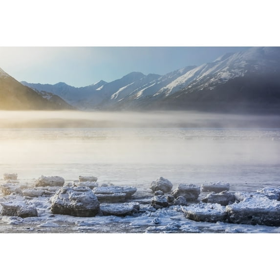 The Sun Shines Through Low Altitude Fog Cast In Warm Light Along Turnagain Arm And The Seward Highway Sea Ice Covering The Ocean In The