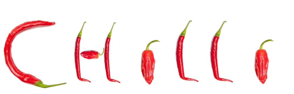 The Word chilli Spelled With Red Jalapeno Peppers Canvas Art - John Short Design Pics (36 x 12)