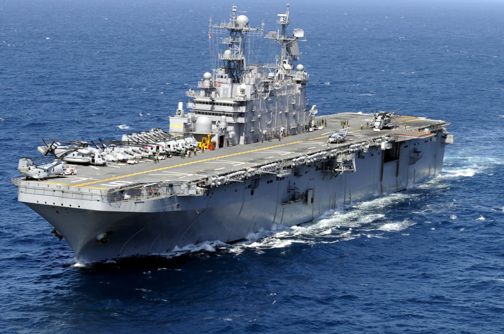 The amphibious assault ship USS Peleliu in transit in the Pacific Ocean Canvas Art - Stocktrek Images (34 x 23)