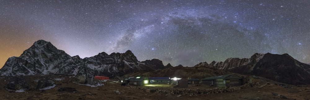 The arch of the Milky Way galaxy and bright zodiacal light over the Himalayas in Nepal Canvas Art - Jeff DaiStocktrek Images (50 x 16)