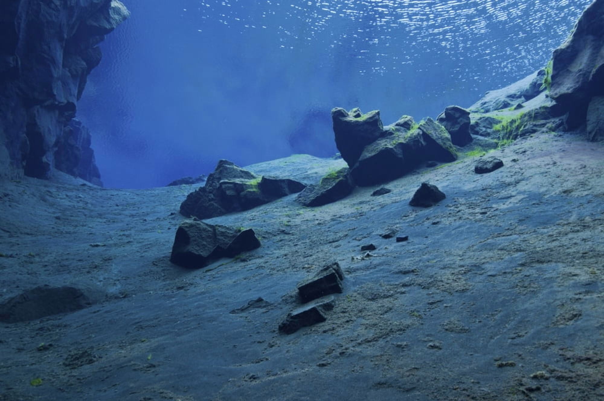 The clear water of the lagoon at Silfra Crack Iceland Canvas Art - Mathieu MeurStocktrek Images (18 x 12)