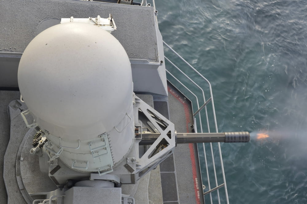 The close-in weapons system during a live fire exercise aboard USS Harry S Truman Canvas Art - Stocktrek Images (34 x 23)