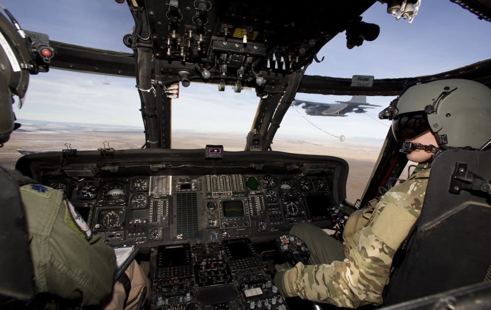 The crew of an HH-60G Pave Hawk prepare to conduct aerial refueling Canvas Art - HIGH-G ProductionsStocktrek Images (36 x 23)