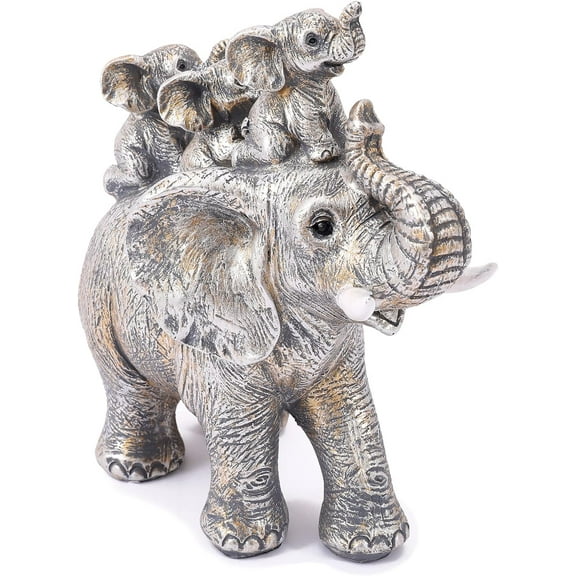 The cute silver lucky elephant is carrying three little calves on its back. There is a small statue on its back