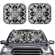The front windshield of a car has a folding visor