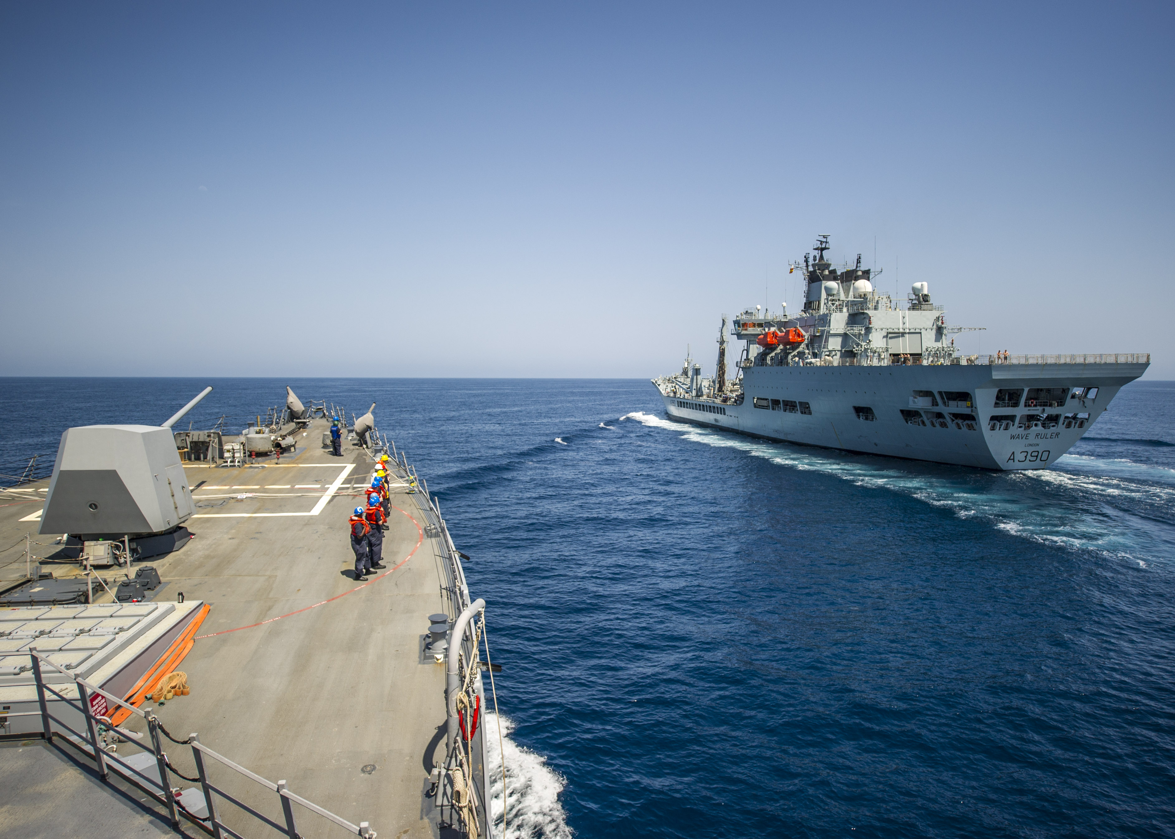 The guidedmissile destroyer USS Truxtun (DDG 103) approaches the Royal