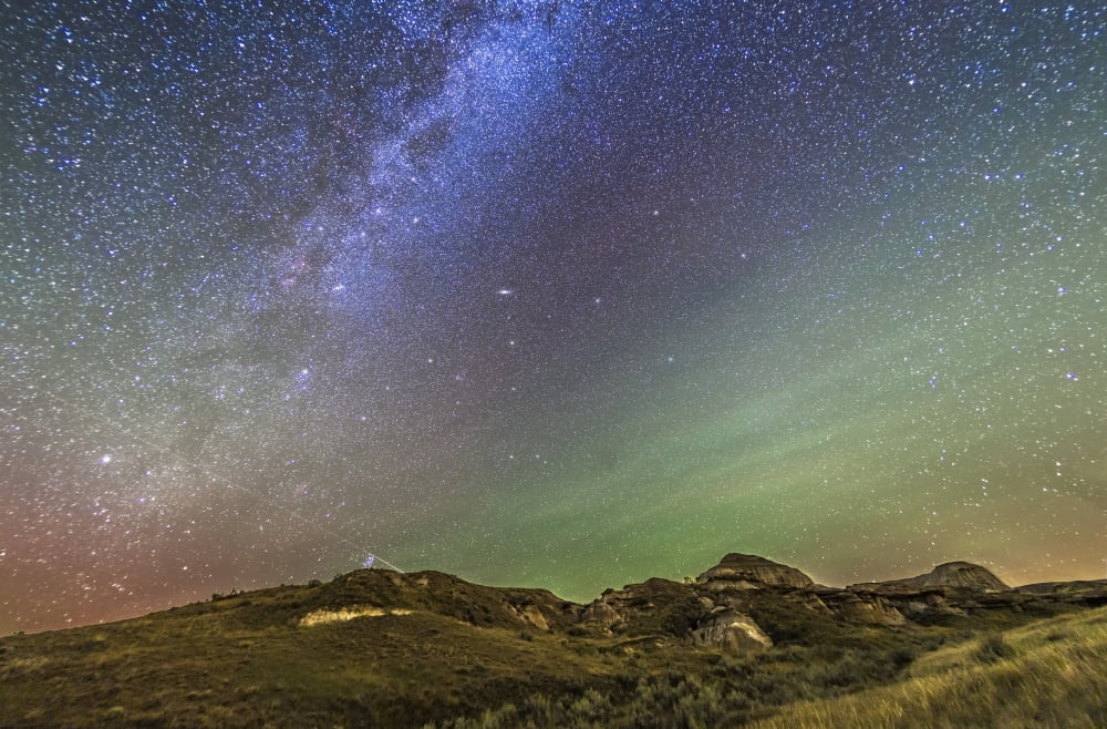 The northern autumn stars and constellations rising over Dinosaur Provincial Park Canvas Art - Alan DyerStocktrek Images (17 x 12)