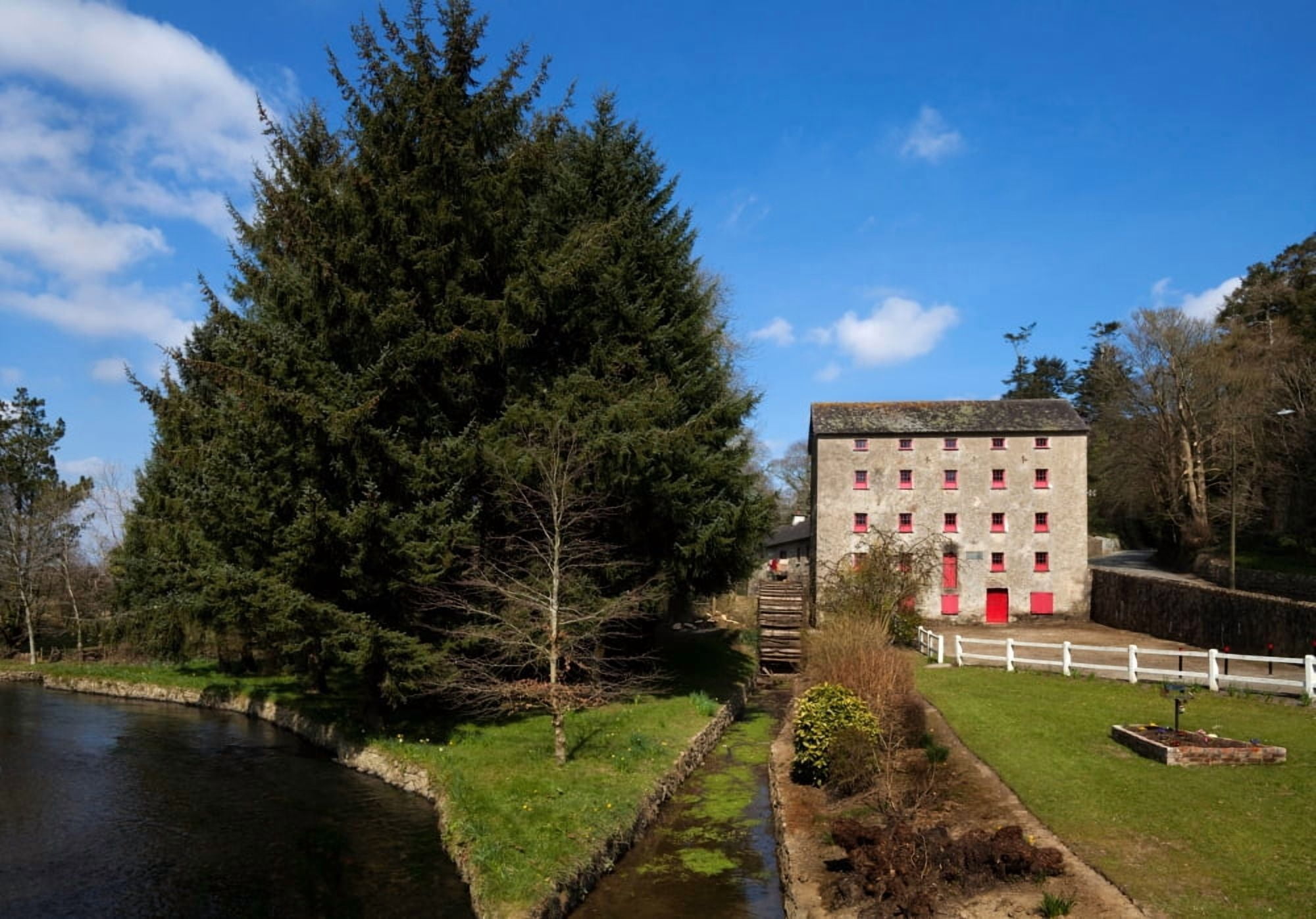 The old water wheel and flour-mill on the River Corock Foulkesmill County Wexford Ireland Canvas Art - Panoramic Images (12 x 36)