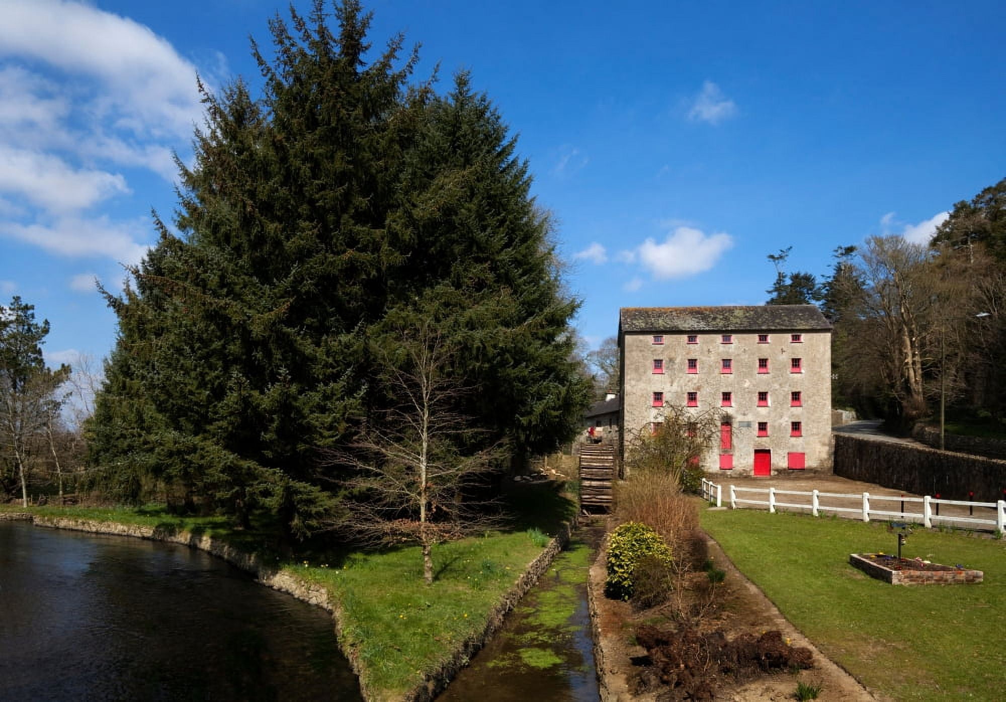The old water wheel and flour-mill on the River Corock Foulkesmill County Wexford Ireland Canvas Art - Panoramic Images (9 x 27)