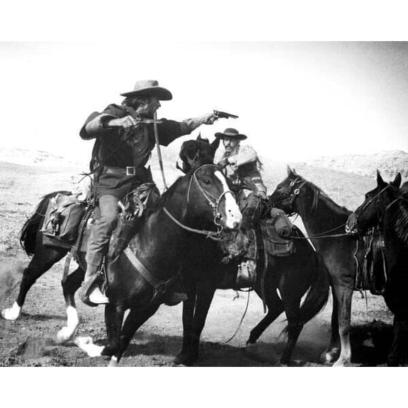 The outlaw Josey Wales 1976 Clint eastwood opens fire on horseback 16x20 poster