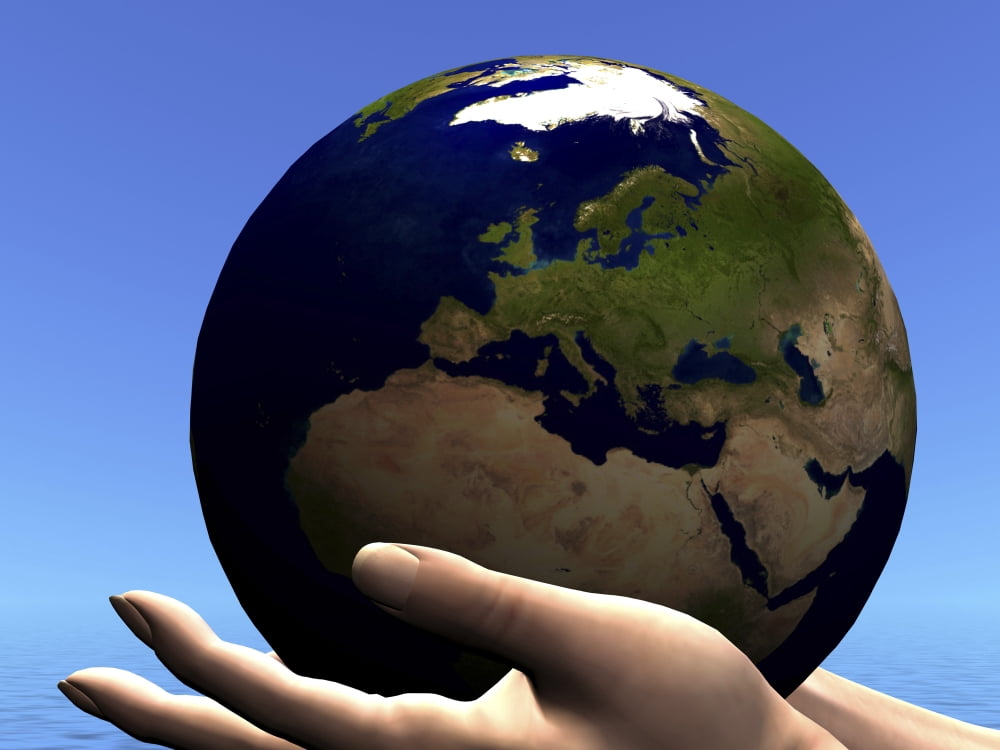 The planet Earth is held in caring human hands Canvas Art - Corey FordStocktrek Images (17 x 13)