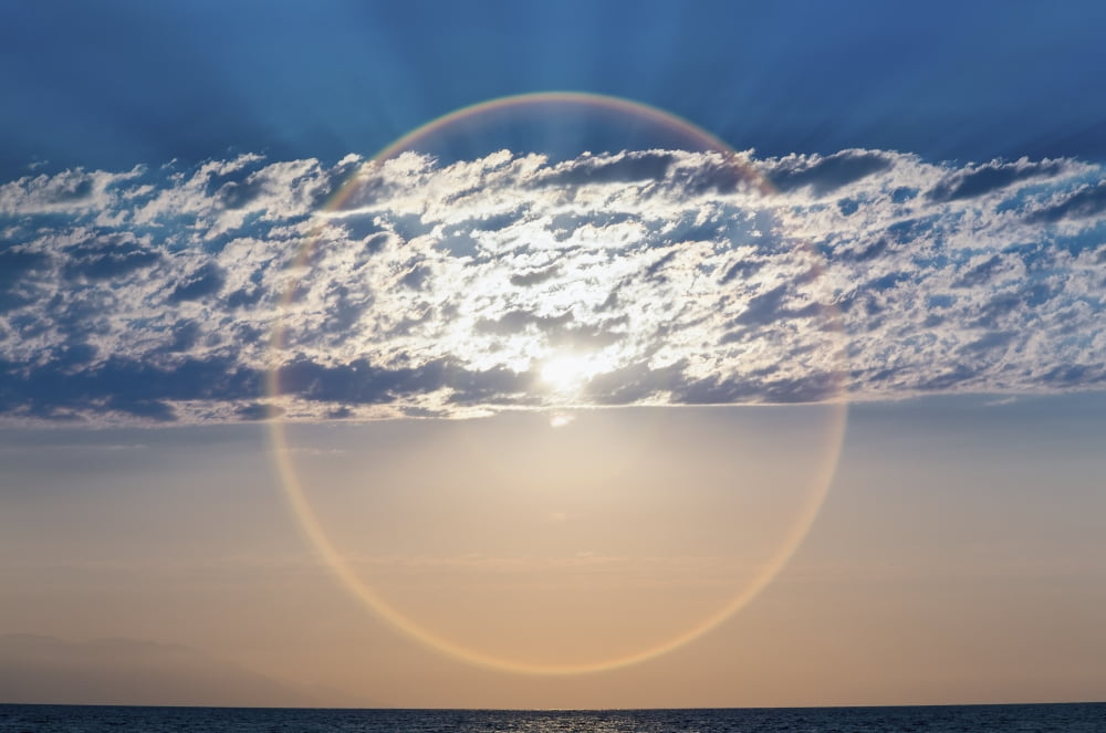 The setting sun creates a sundogPuerta vallarta mexico Canvas Art - Debra Brash Design Pics (38 x 24)