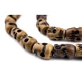 thumbnail image 1 of The Bead Chest Brown Carved Bone Skull Mala Beads 12x8mmLong Strand Nepal Large Hole 50 Inch Strand, 1 of 4