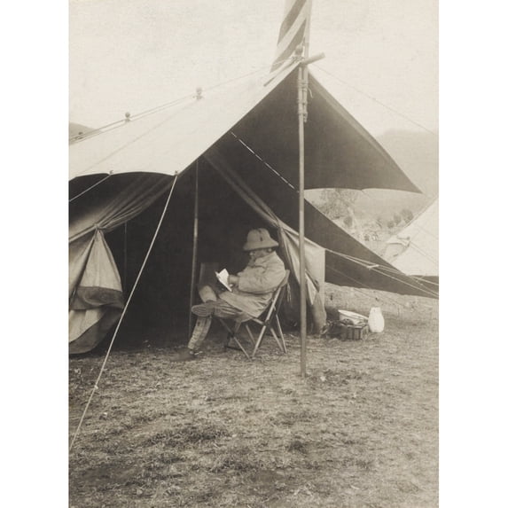 Theodore Roosevelt Reading In Front Of His Tent In Hunting Camp History (18 x 24)