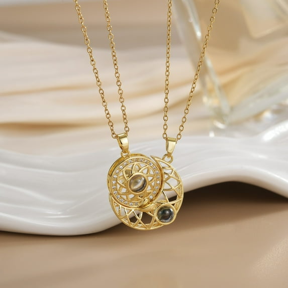 This magnetic sun, moon, and heart-shaped couple's necklace makes a stylish and sophisticated gift for friends, girlfriends, and lovers.