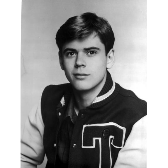 Thomas Howell wearing a varsity jacket Photo Print (24 x 30)