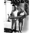 thumbnail image 1 of Thor Heyerdahl And Wife Yvonne Heyerdahl Hold Model Of "Ra" History (18 x 24), 1 of 1