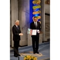 thumbnail image 1 of Thorbjorn Jagland Presents President Obama With The Nobel Prize Medal And Diploma During The Nobel Peace Prize Ceremony, 1 of 2