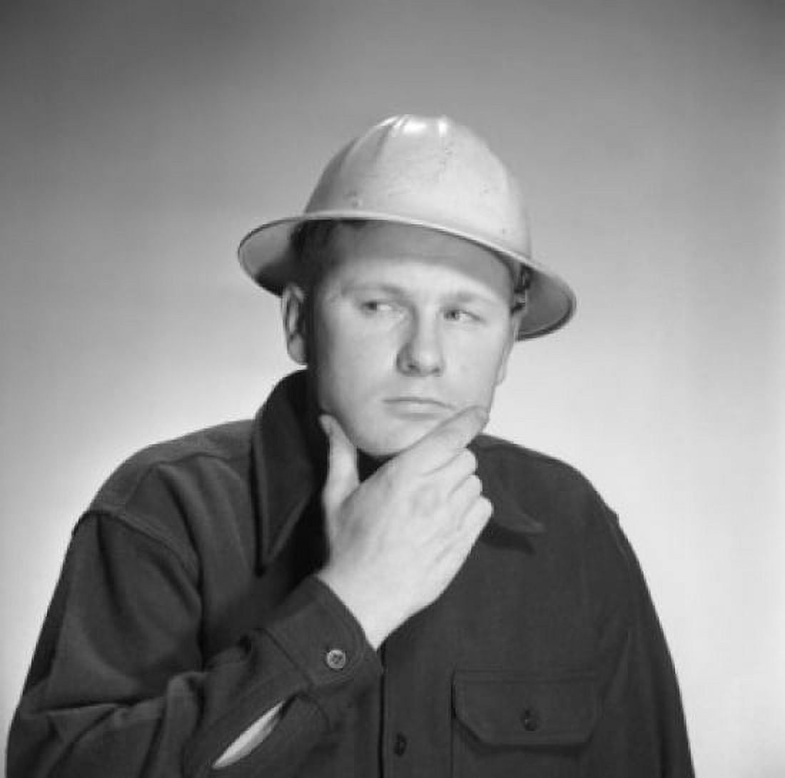 Thoughtful young man looking away studio shot Canvas Art - (24 x 36)