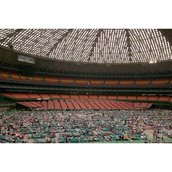 Thousands Of Hurricane Katrina Survivors From New Orleans Were Bused To A Red Cross Shelter In The Houston Astrodome.