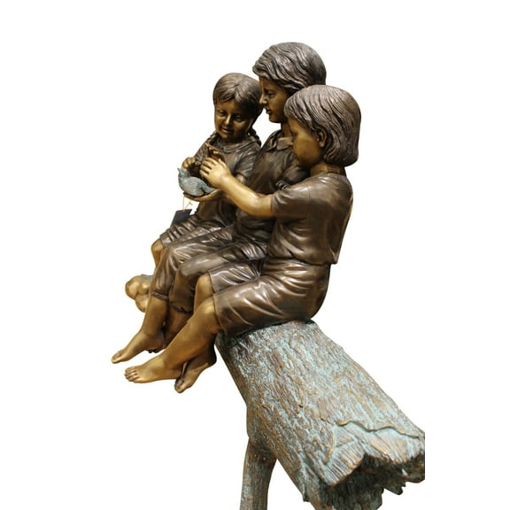 Three Children On Log Holding Bird Bronze Statue - Size: 55"L x 18"W x 38"H.