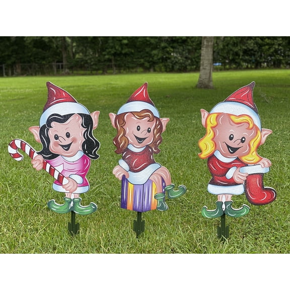 Three Christmas girl Elves