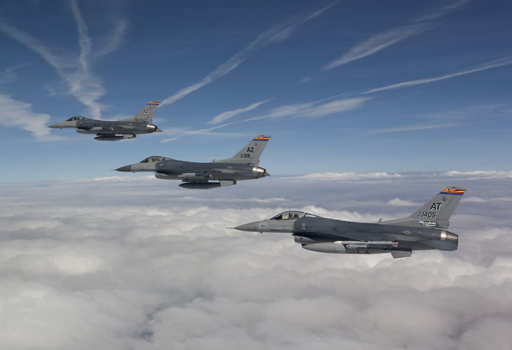 Three F-16s fly in formation during a training mission over Arizona Canvas Art - HIGH-G ProductionsStocktrek Images (18 x 12)