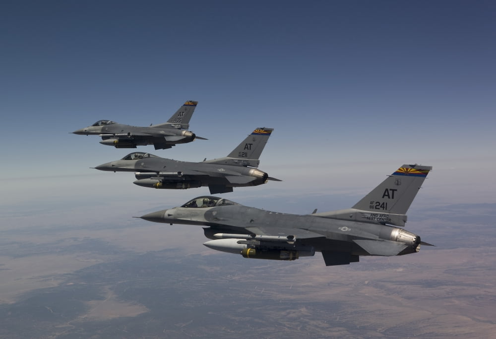 Three F-16s fly in formation over Arizona Canvas Art - HIGH-G ProductionsStocktrek Images (35 x 24)
