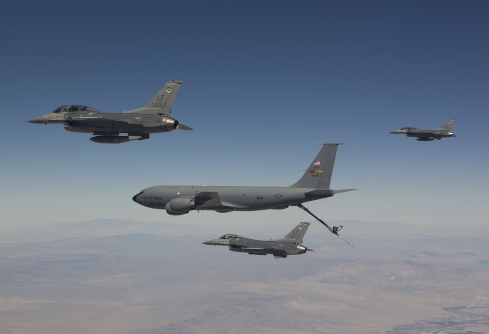 Three F-16s join up with a KC-135 over Arizona Canvas Art - HIGH-G ProductionsStocktrek Images (35 x 24)
