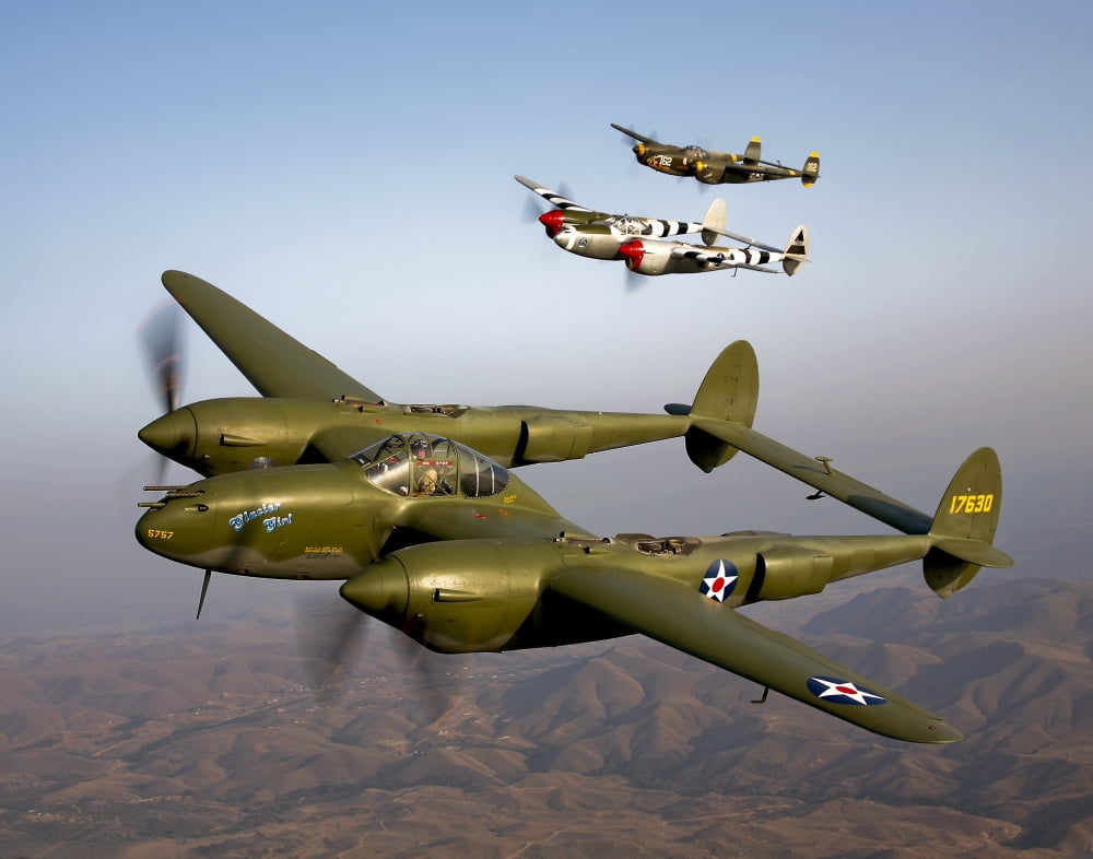 Three Lockheed P-38 Lightnings in flight Canvas Art - Scott GermainStocktrek Images (32 x 25)