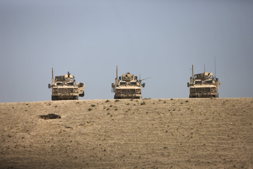 Three M-ATVs guard the top of the wadi near Kunduz Afghanistan Canvas Art - Terry MooreStocktrek Images (18 x 12)