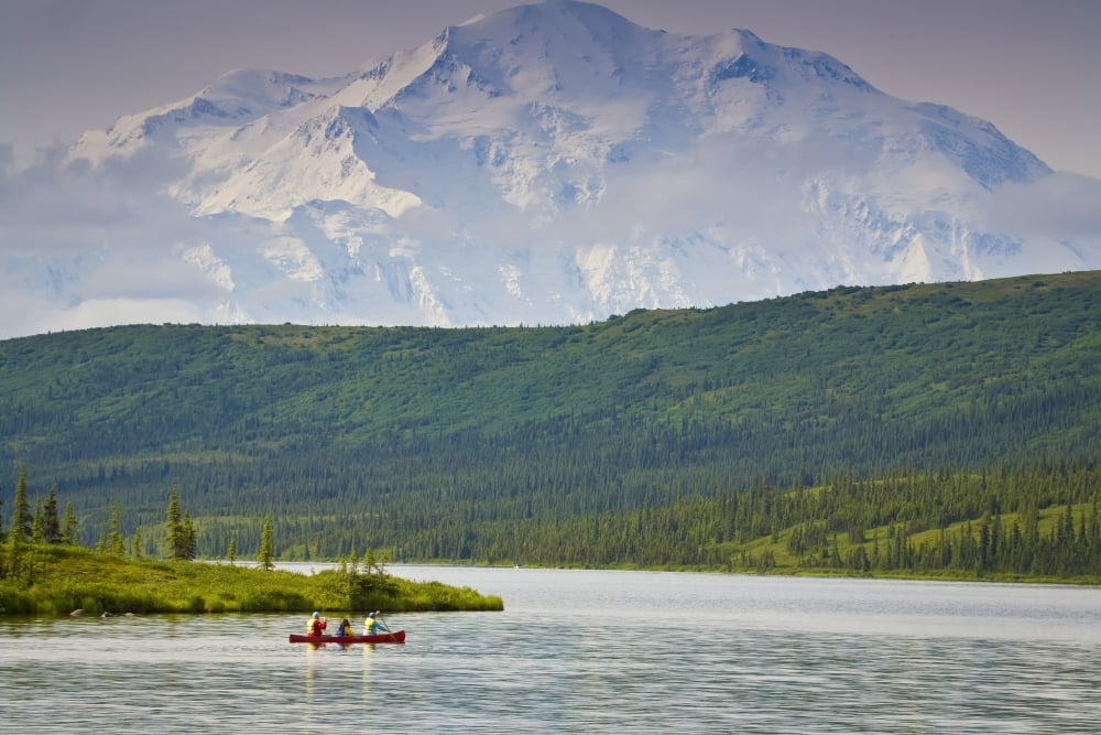 Three People In One Canoe On Wonder Lake With Mt Mckinley In Background In Denali National Park Alaska During Summer Canvas Art - Jeff Schultz Design Pics (34 x 22)