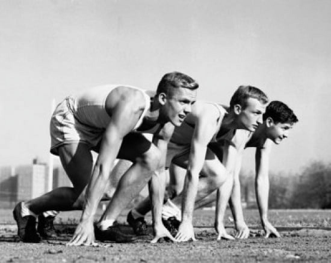 Three athletes at the starting position of a race Canvas Art - (18 x 24)