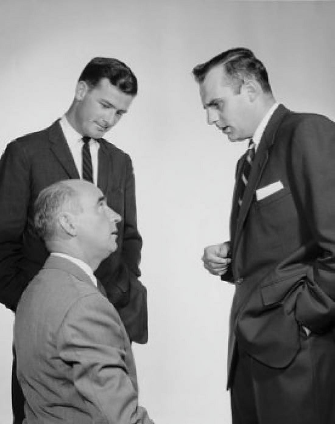 Three businessmen talking Canvas Art - (18 x 24)
